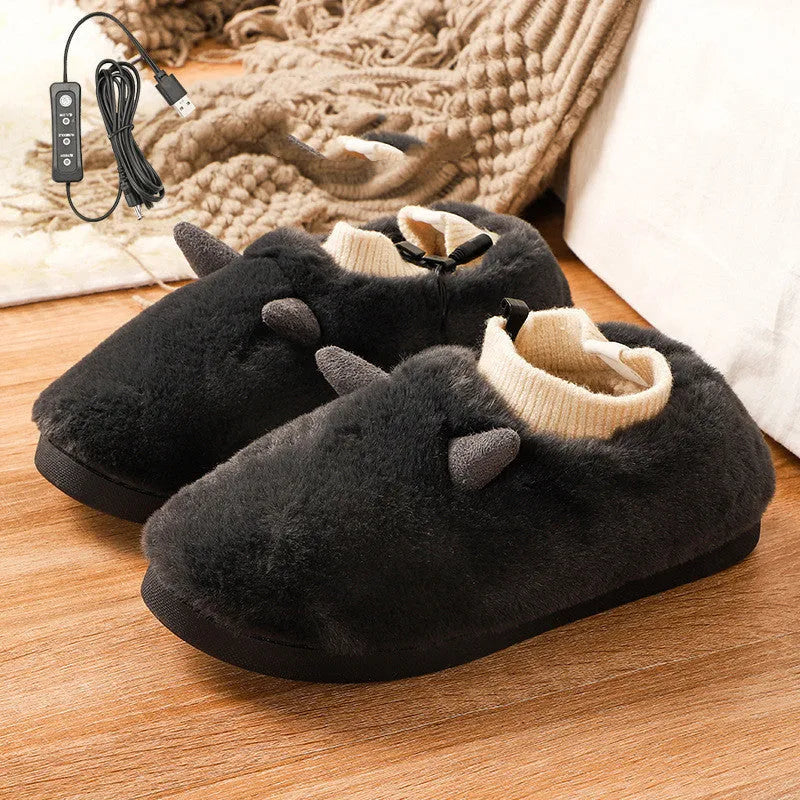 USB electric heating slippers in velvet, showing USB cable connection and adjustable temperature control.