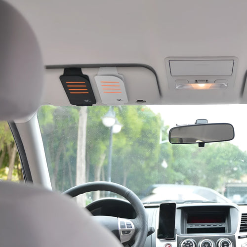 Set of four foldable car sun shade panels and a storage bag for vehicle sun protection.