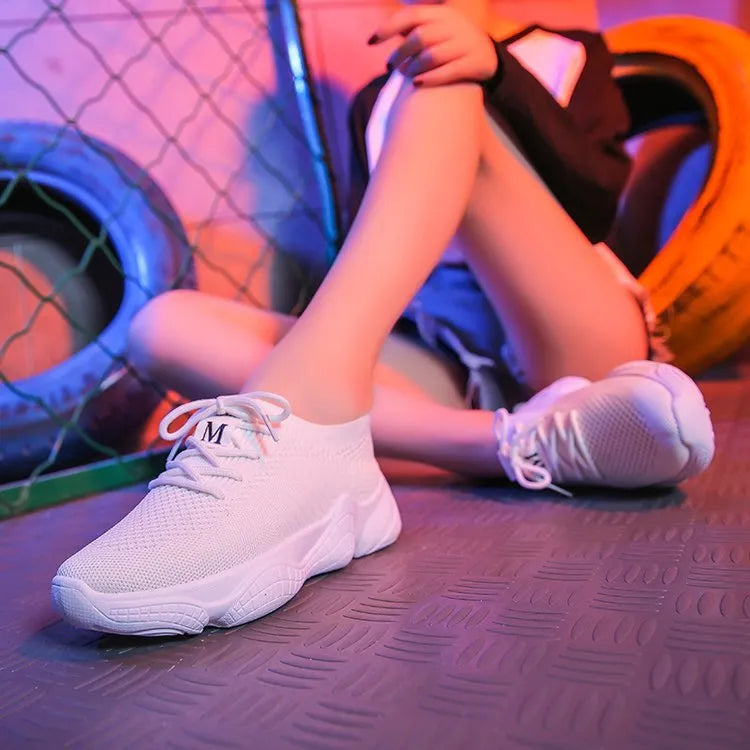 Women's white thick-soled woven sports shoes with a front strap and round toe