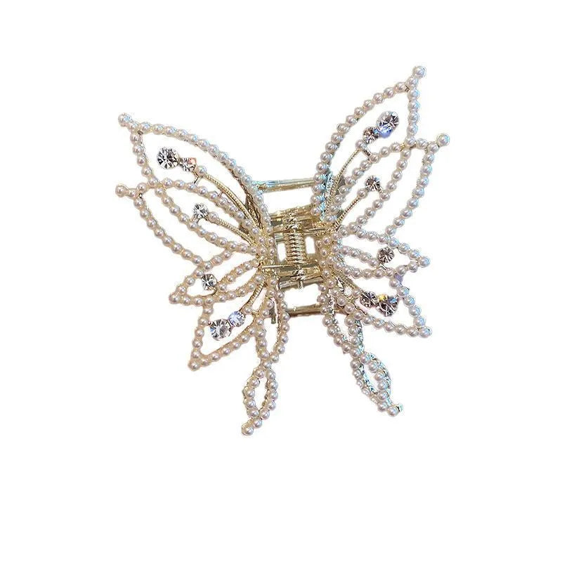 Butterfly hair barrettes in alloy measuring 6.7 by 6.2 cm with decorative elements