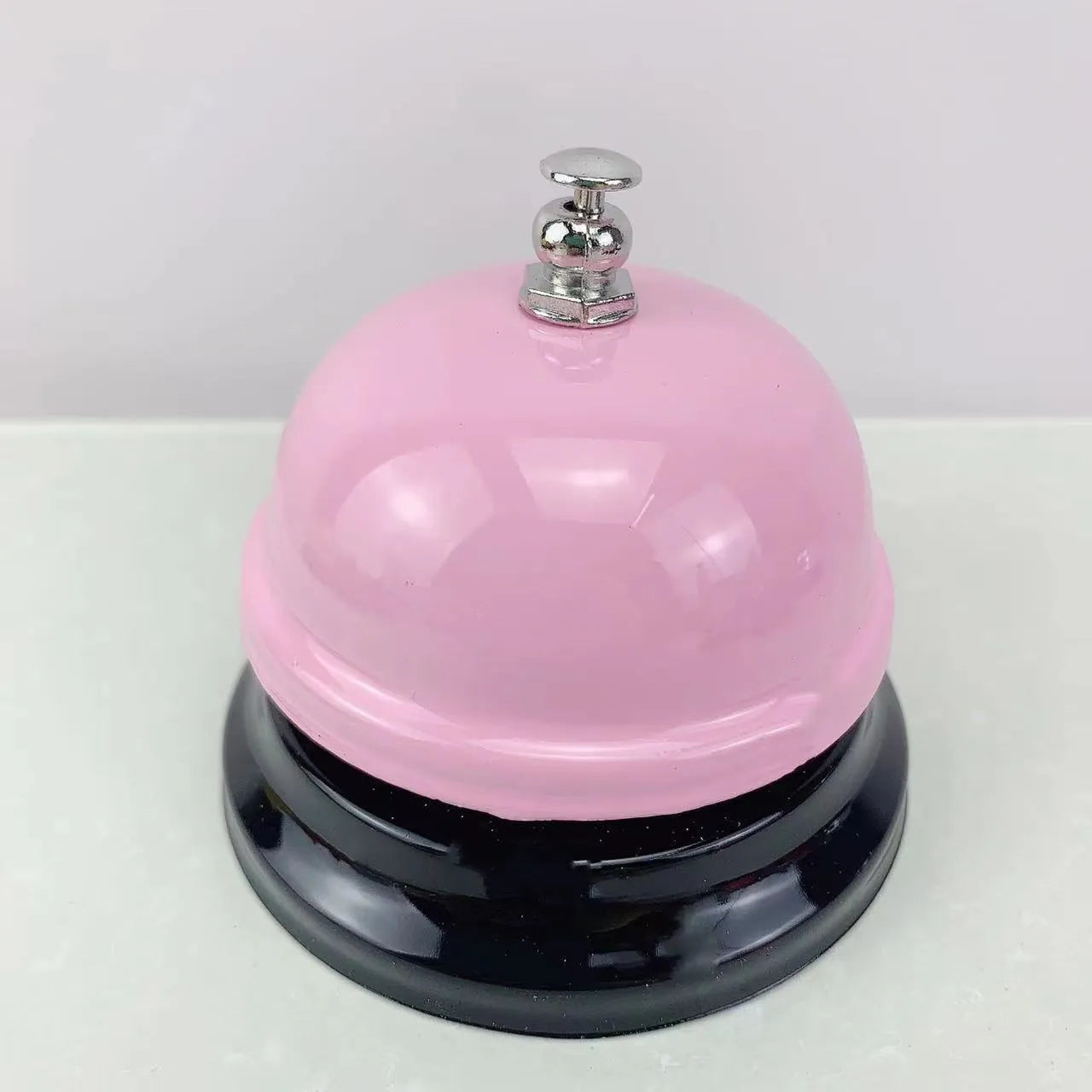 Iron class game bell in one of eleven colour options including red, green, blue, pink and yellow.