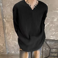 Women's plus size striped texture pullover top in grey, showing loose fit and long sleeves.