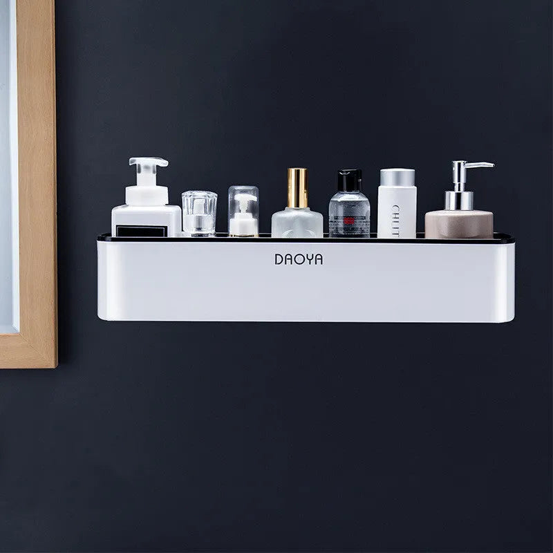 Plastic wall-mounted bathroom shelf with hole-free installation for shampoo and shower gel storage.
