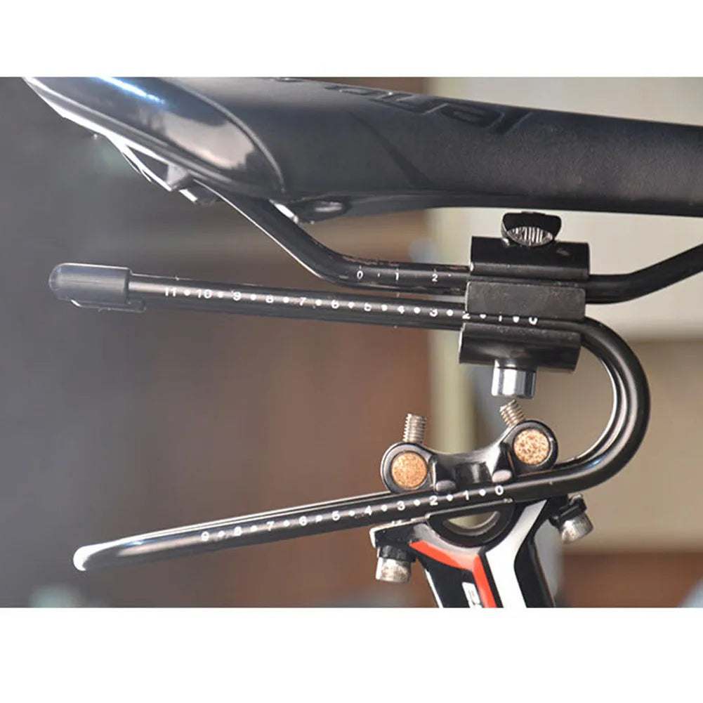 Black bicycle seatpost suspension device on bike showing spring steel alloy construction