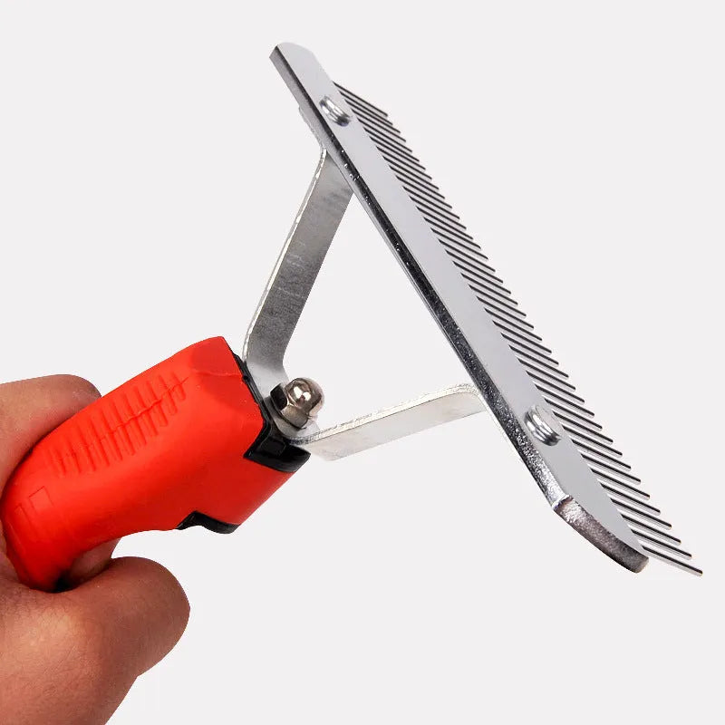 Large red dog comb with rubber handle and alloy steel teeth on surface
