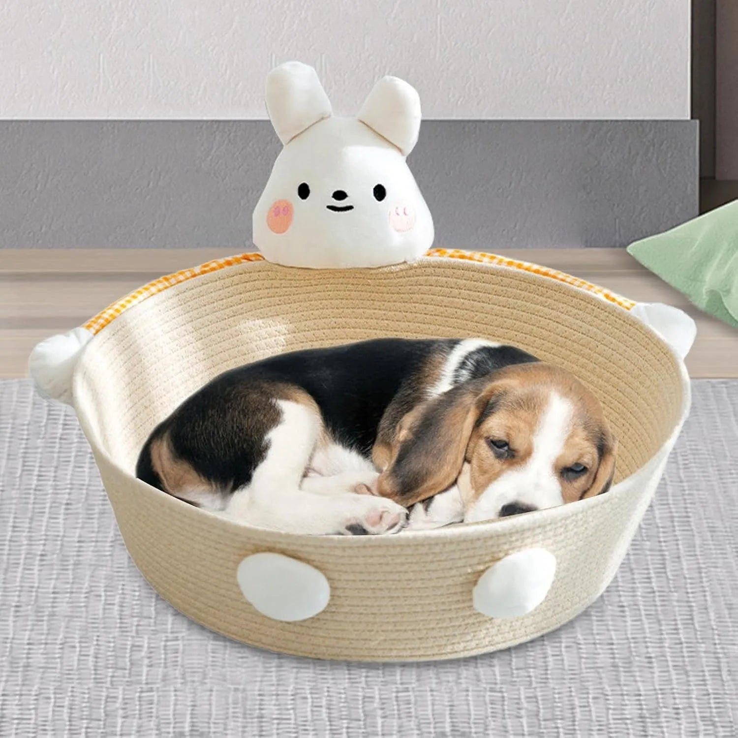 Woven cotton rope basket serving as a cat bed and scratcher in a natural colour.