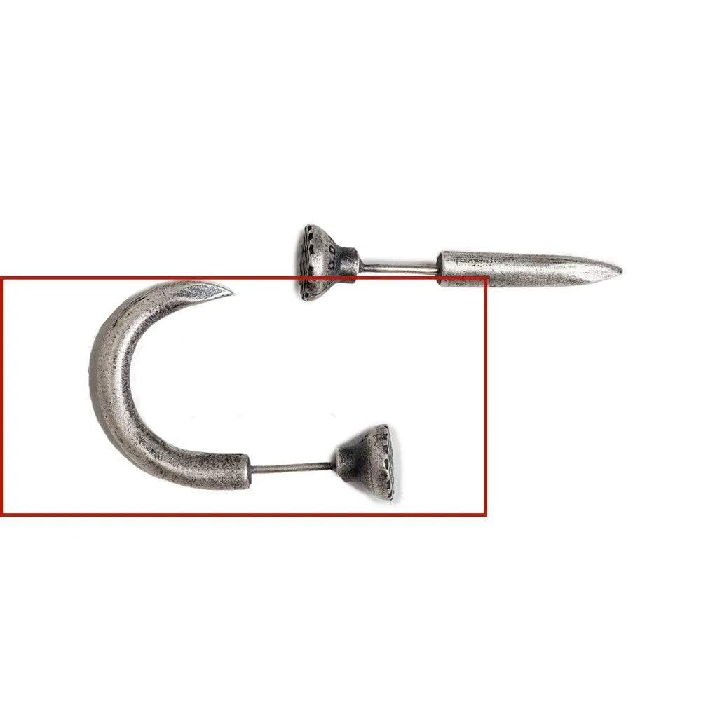 Close-up of a sterling silver S925 punk-style earring shaped like a retro nail, shown on a hook back.