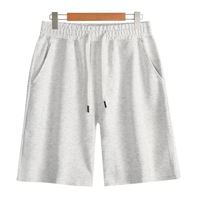 Cotton straight-leg summer shorts in light grey shown on a hanger