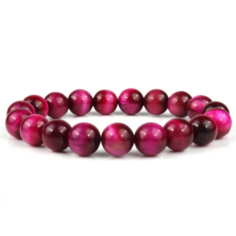 Unisex tigereye crystal bead bracelet with round geometric beads, shown in a dark blue variant.
