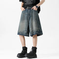 Men's retro blue denim shorts with splash ink pattern and ripped straight-leg design