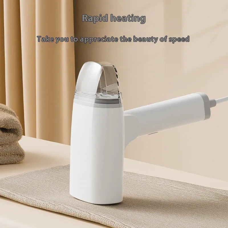 Handheld garment steamer in white or blue with mechanical controls and compact design