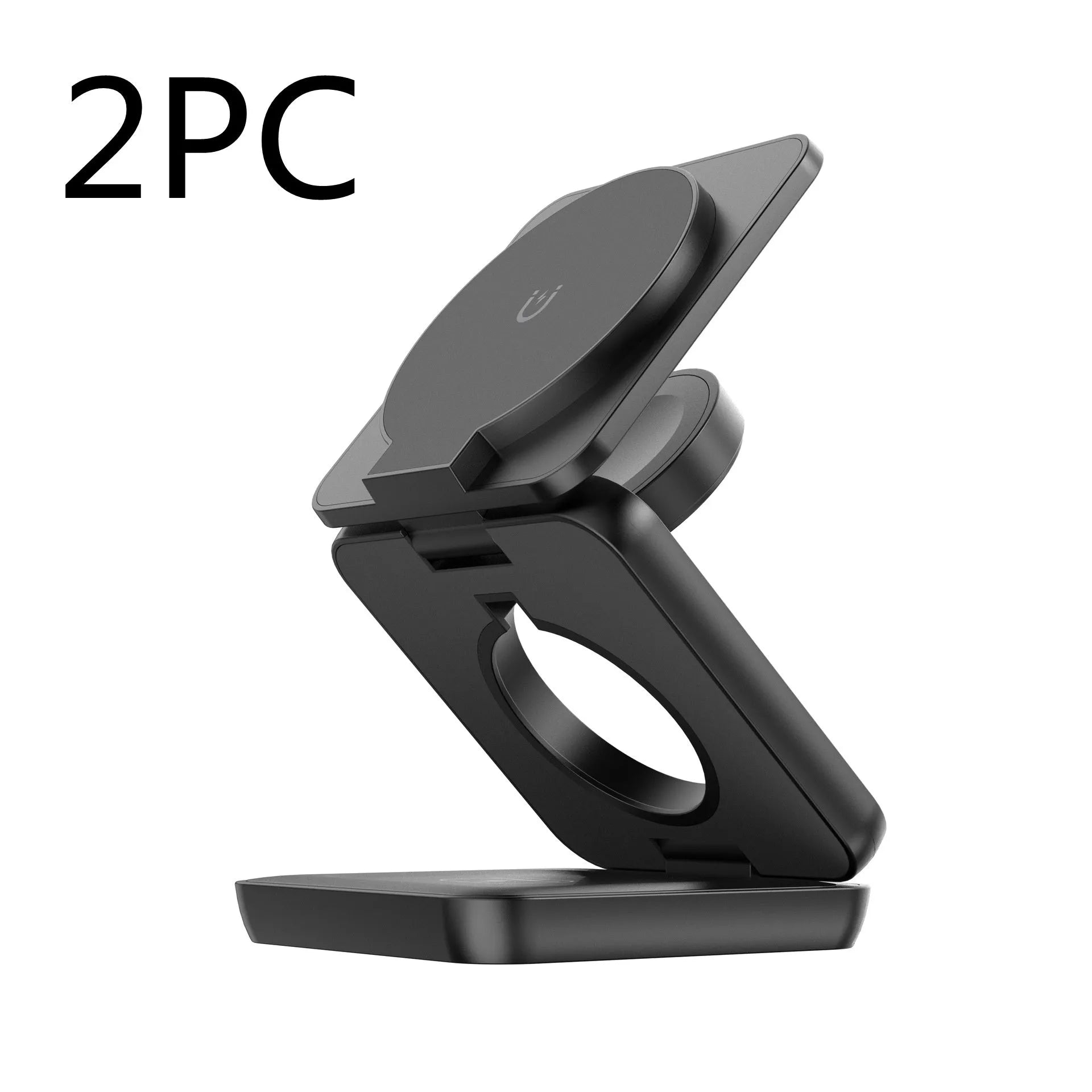 White foldable magnetic wireless charging phone stand on a wooden desk next to a mobile phone.