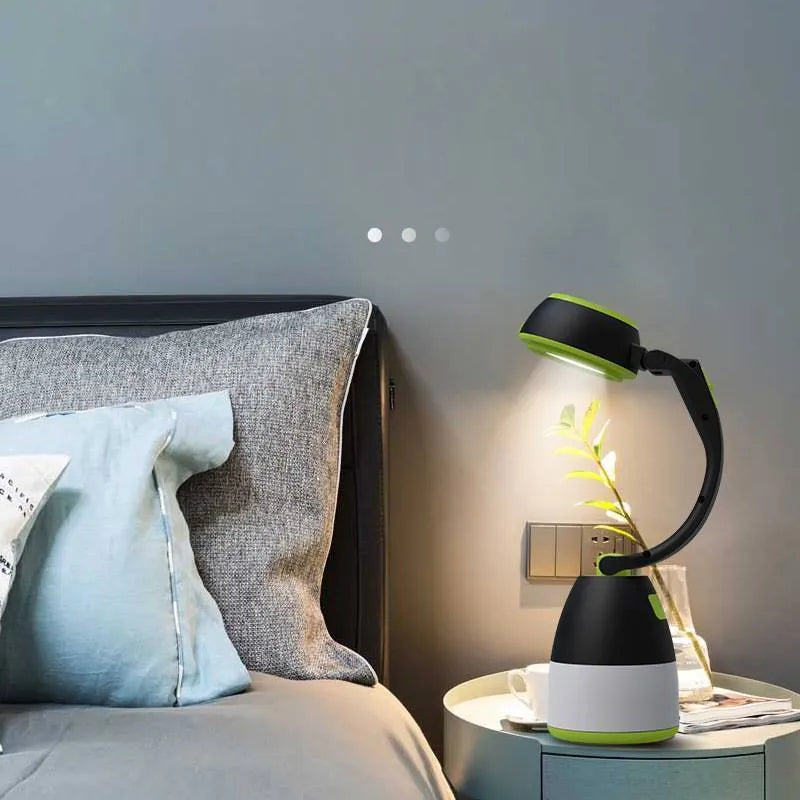 Black green 3-in-1 multifunctional LED table lamp with adjustable head and foldable design.