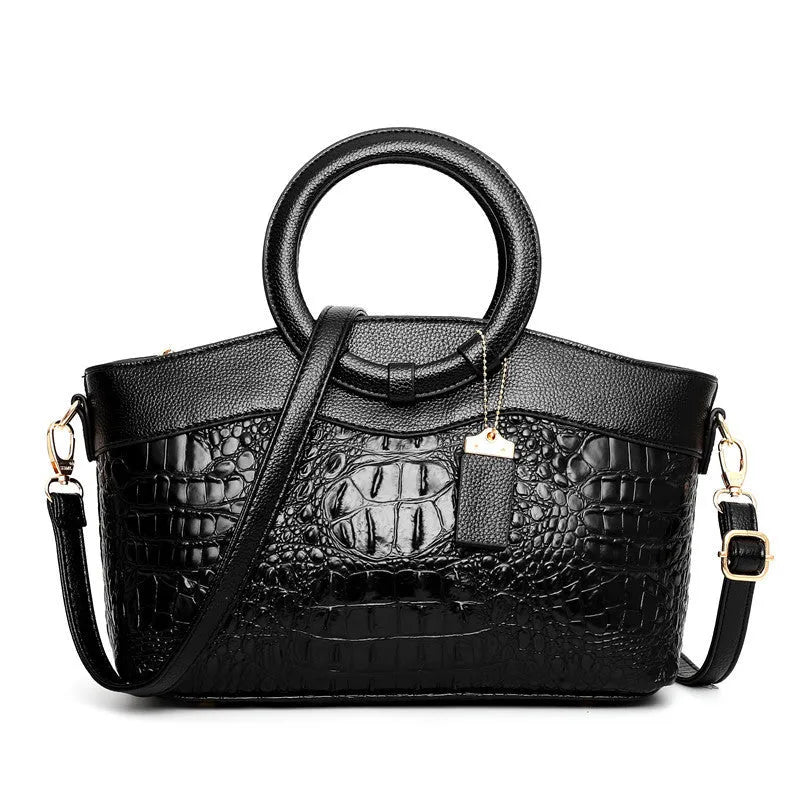 Ladies casual fabric handbag in multiple colours with zipper compartments, shown with shoulder strap.