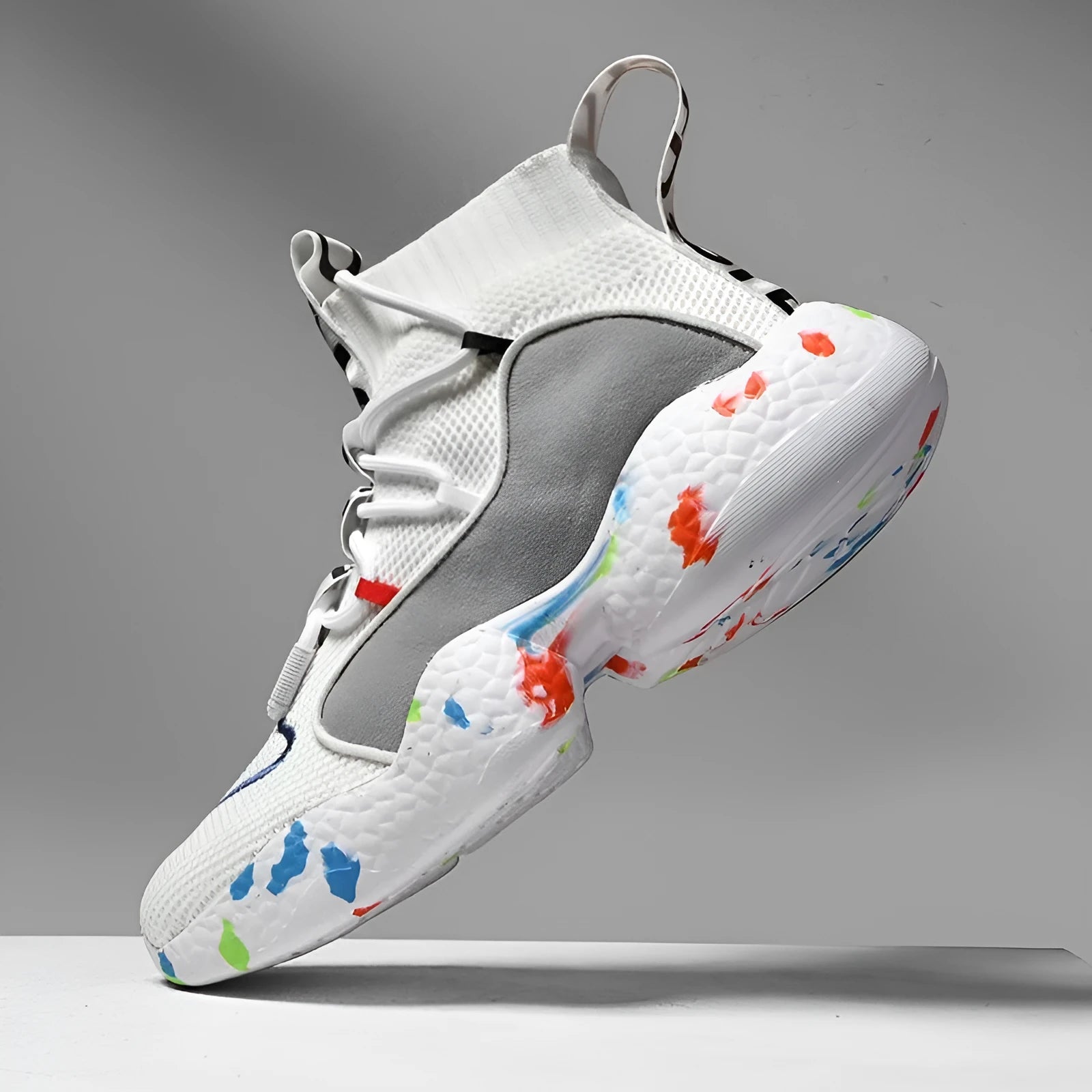 Men's camouflage pattern vulcanised sneakers with mesh upper and flat rubber sole.