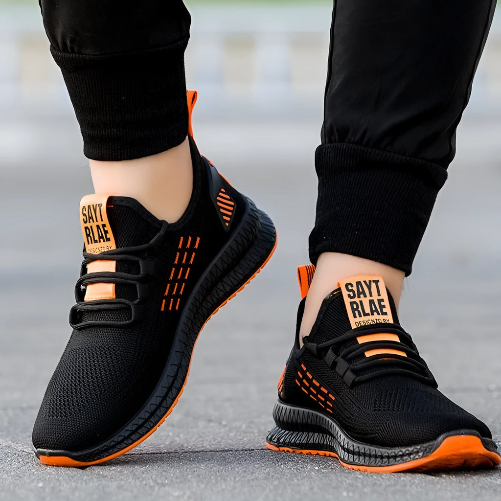 Men's black flying weave sports shoes with cross strap design and round toe