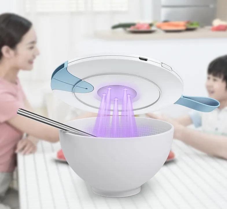 Portable UV baby bottle sterilizer showing compact design with USB port and measuring 163.6mm x 120mm