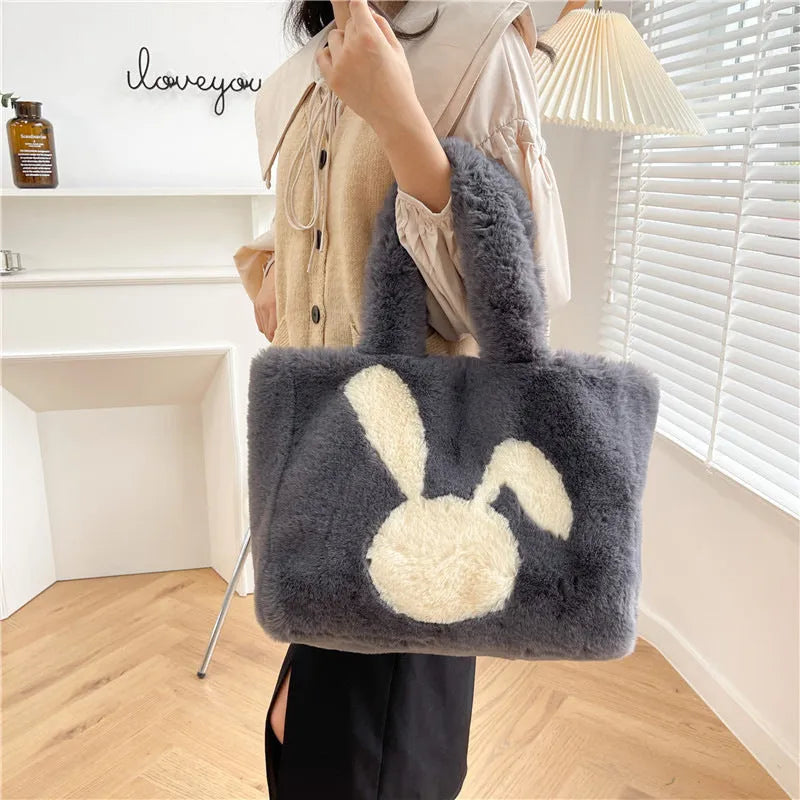 Plush shoulder bag with rabbit ears design in multiple colour options