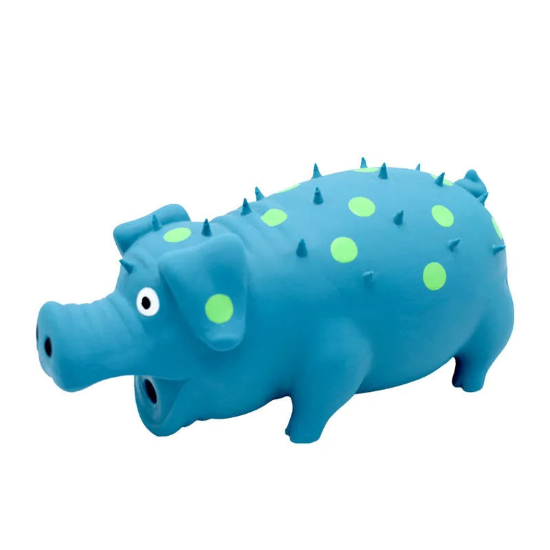 Latex pig-shaped dog chew toy with protruding grain texture in assorted colours