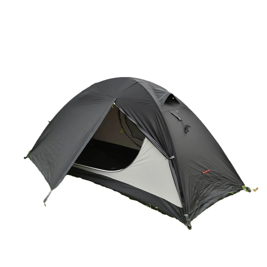 Black single person double account tent with aluminium poles set up outdoors