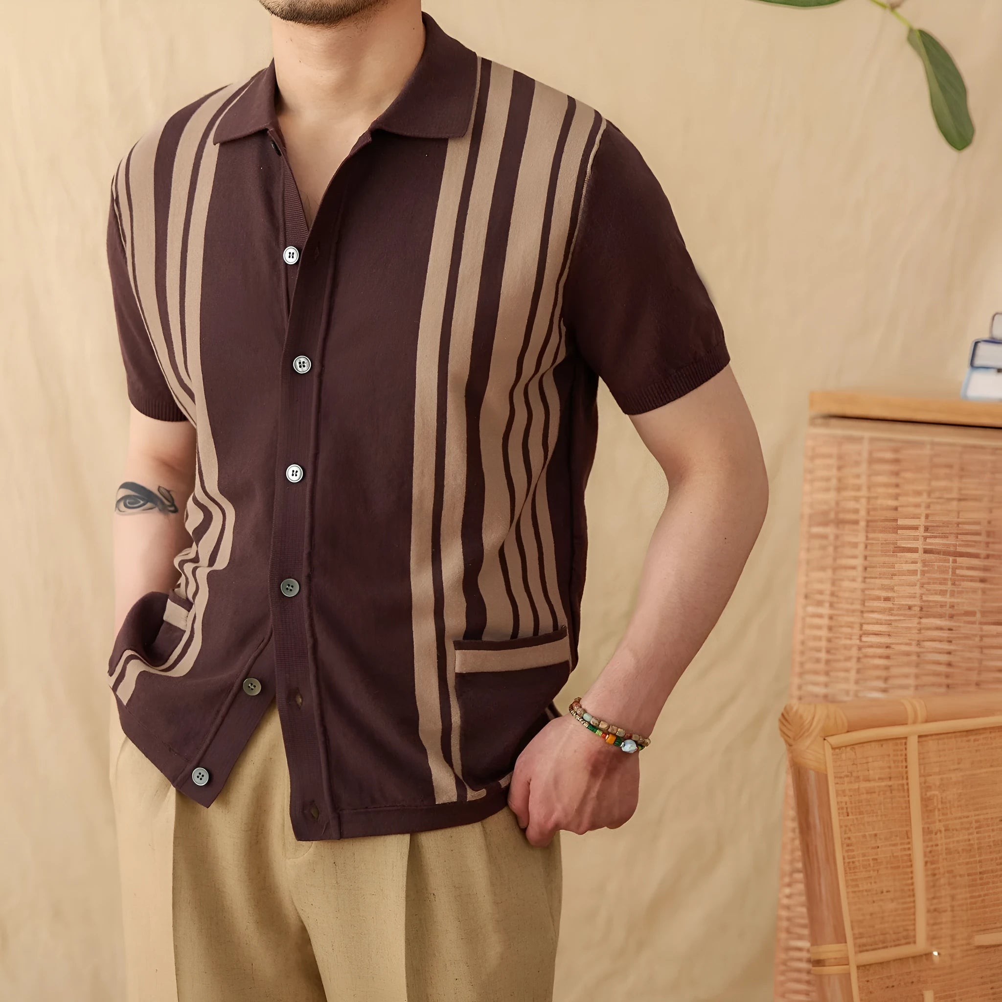 Cotton striped knitted cardigan polo shirt in light blue with lapel collar and short sleeves.
