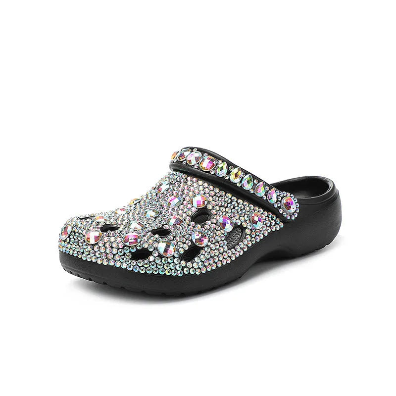 Black women's platform sandals with rhinestone decoration and hole shoes design on an EVA sole.