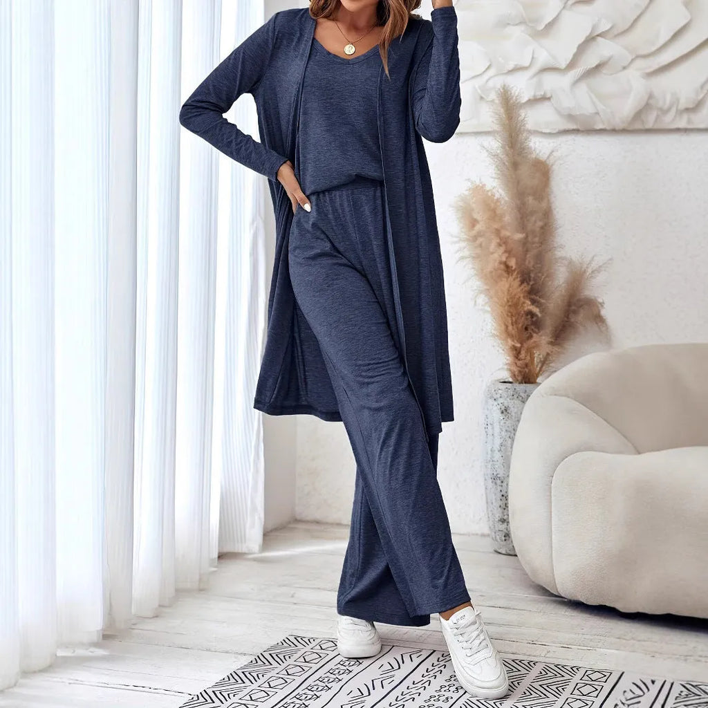 Blue women's casual two-piece set with sling top, cardigan trousers, and suspenders on a hanger.