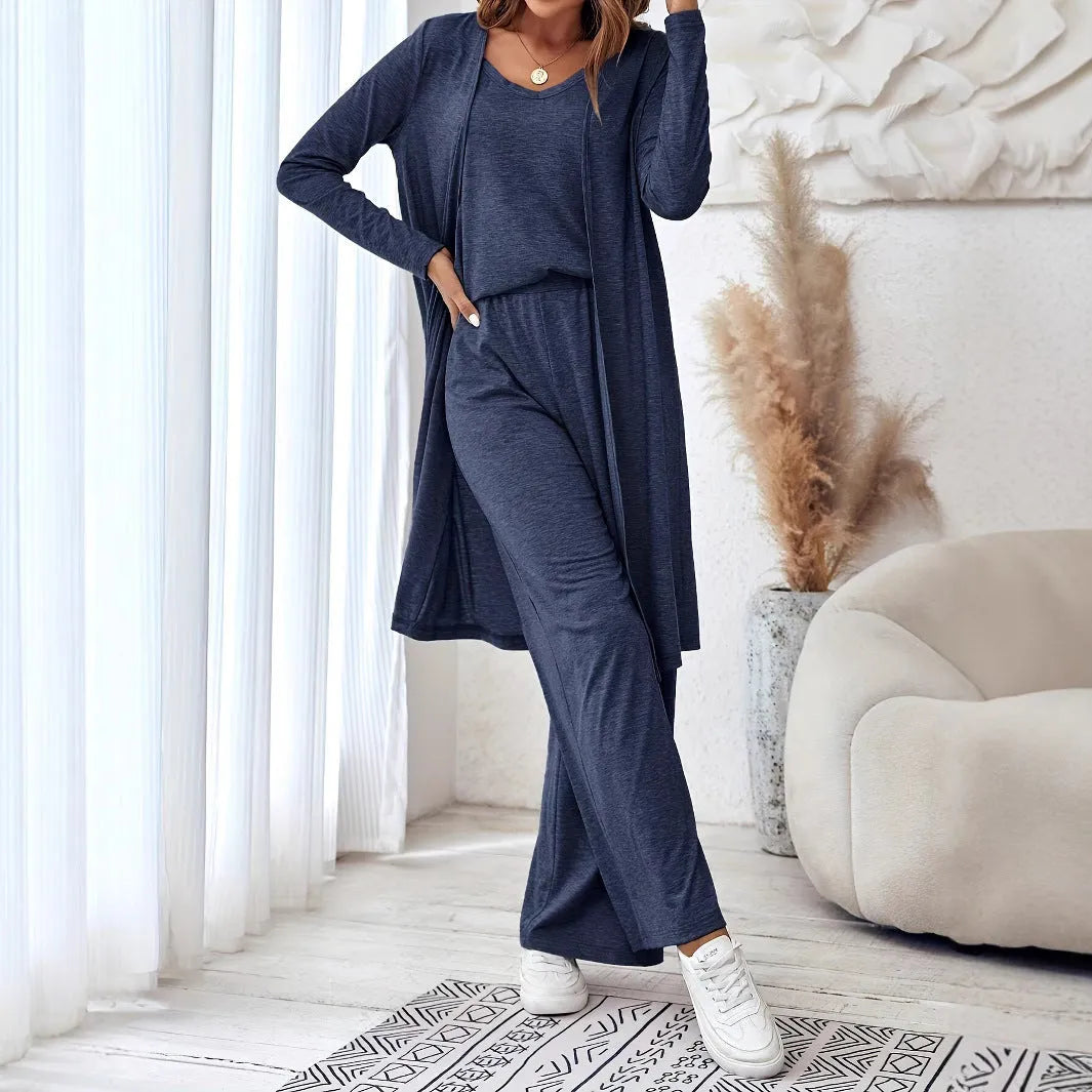 Blue women's casual two-piece set with sling top, cardigan trousers, and suspenders on a hanger.