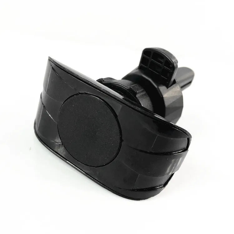 Black car phone holder mounted on vehicle air vent with adjustable clamping arms extended
