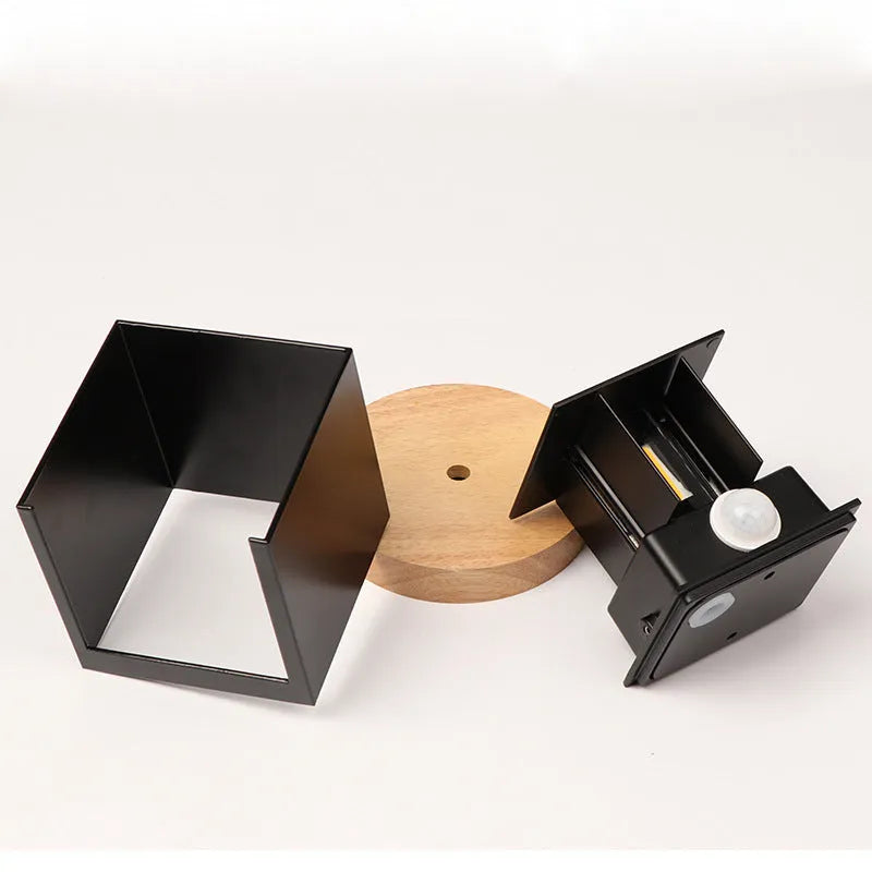 Black, grey, or white cube wall lamp with aluminium housing for corridor and garden lighting.