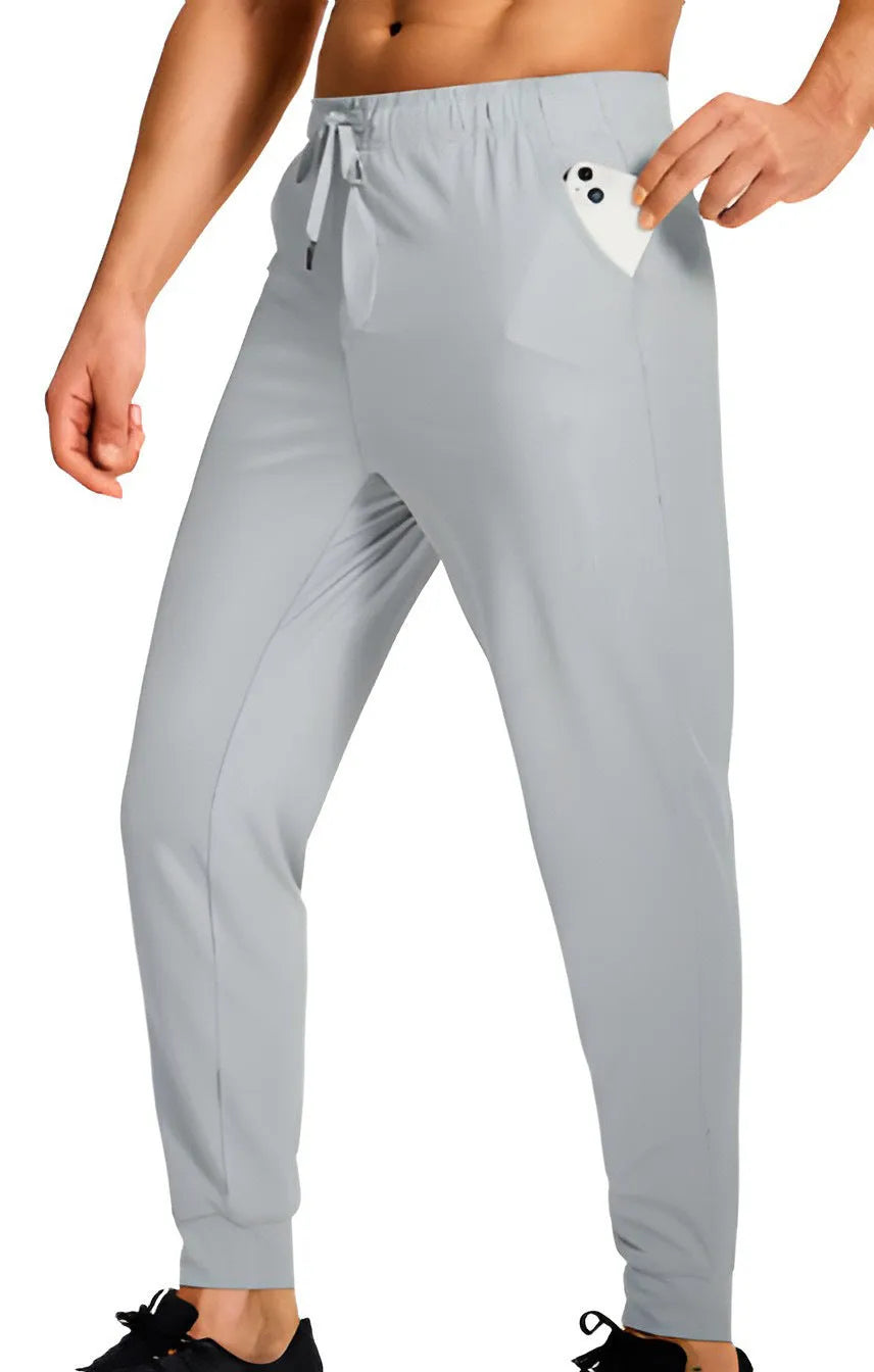 Men's loose fit casual trousers in solid colours with polyester fabric construction