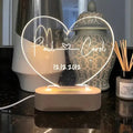 Transparent acrylic custom night light measuring 20cm by 11.5cm with personalised text