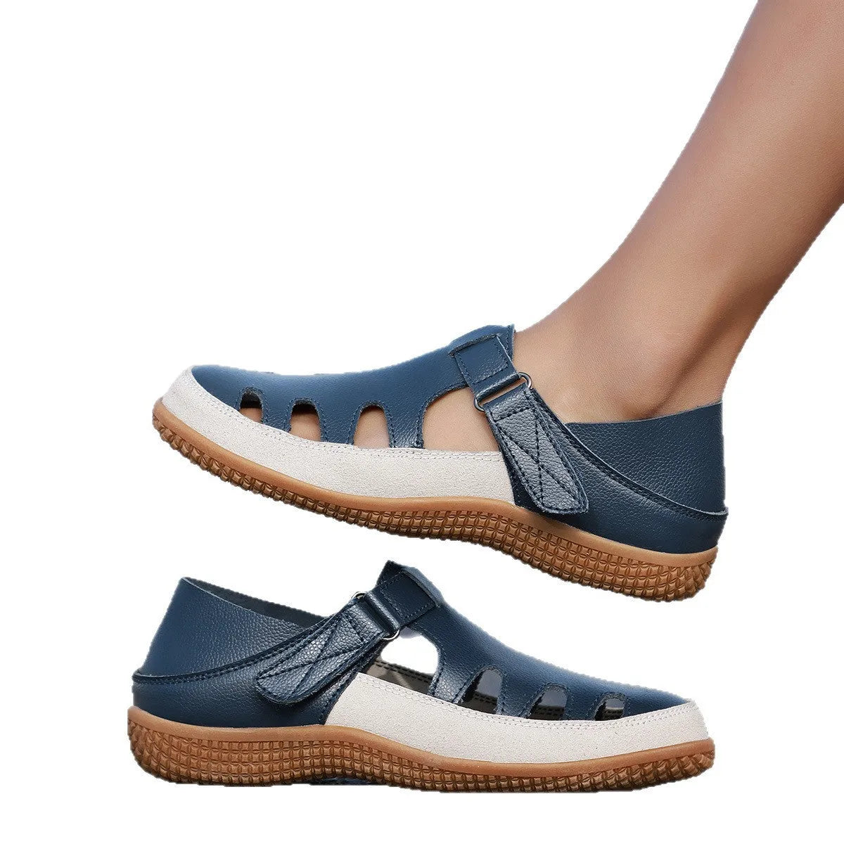 Women's plus size blue flat sandals with a hollow-out toe cap and thick rubber sole.
