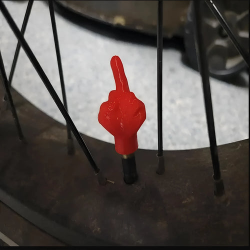 Eight latex tyre valve caps showing black and skin colour options for car tyre protection