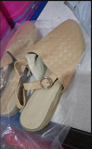 Women's flat buckle sandals with pointed toe in multiple colour options on a white background