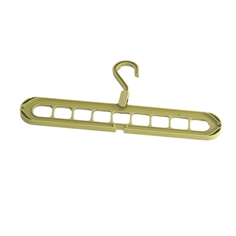 Green plastic nine-hole hanger folded flat showing multiple trouser hanging points