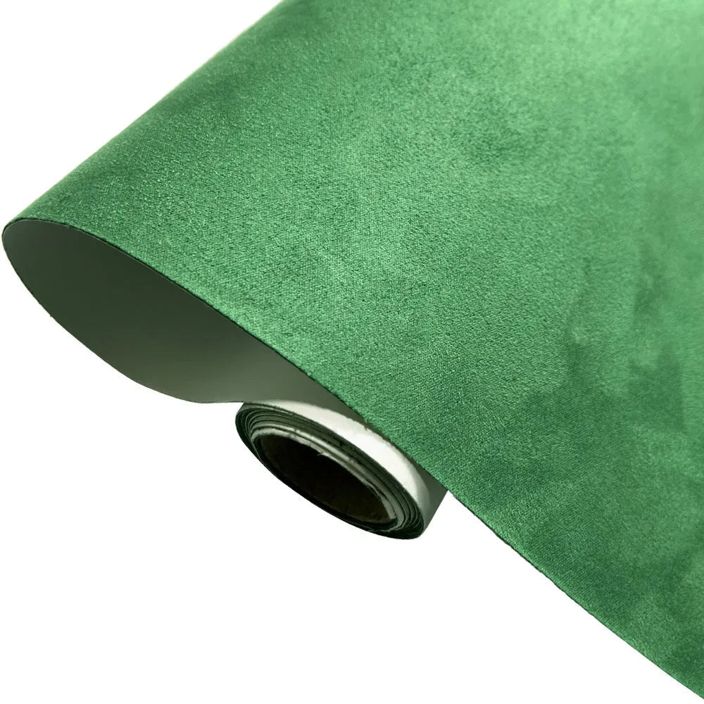 A sheet of self-adhesive black leather suede material with a ruler showing its 0.5mm thickness.