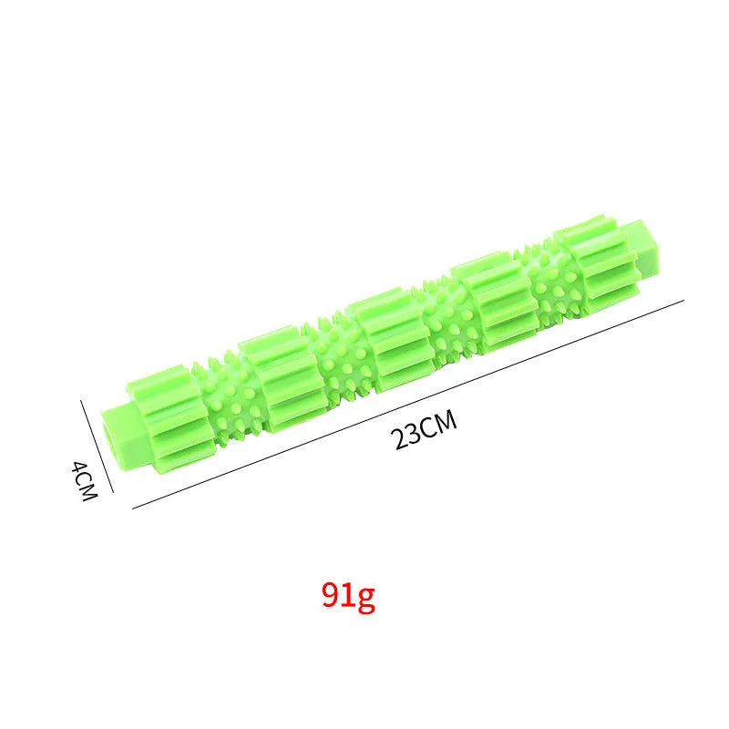 Green natural rubber dog chew toy with textured surface and treat-dispensing hole.