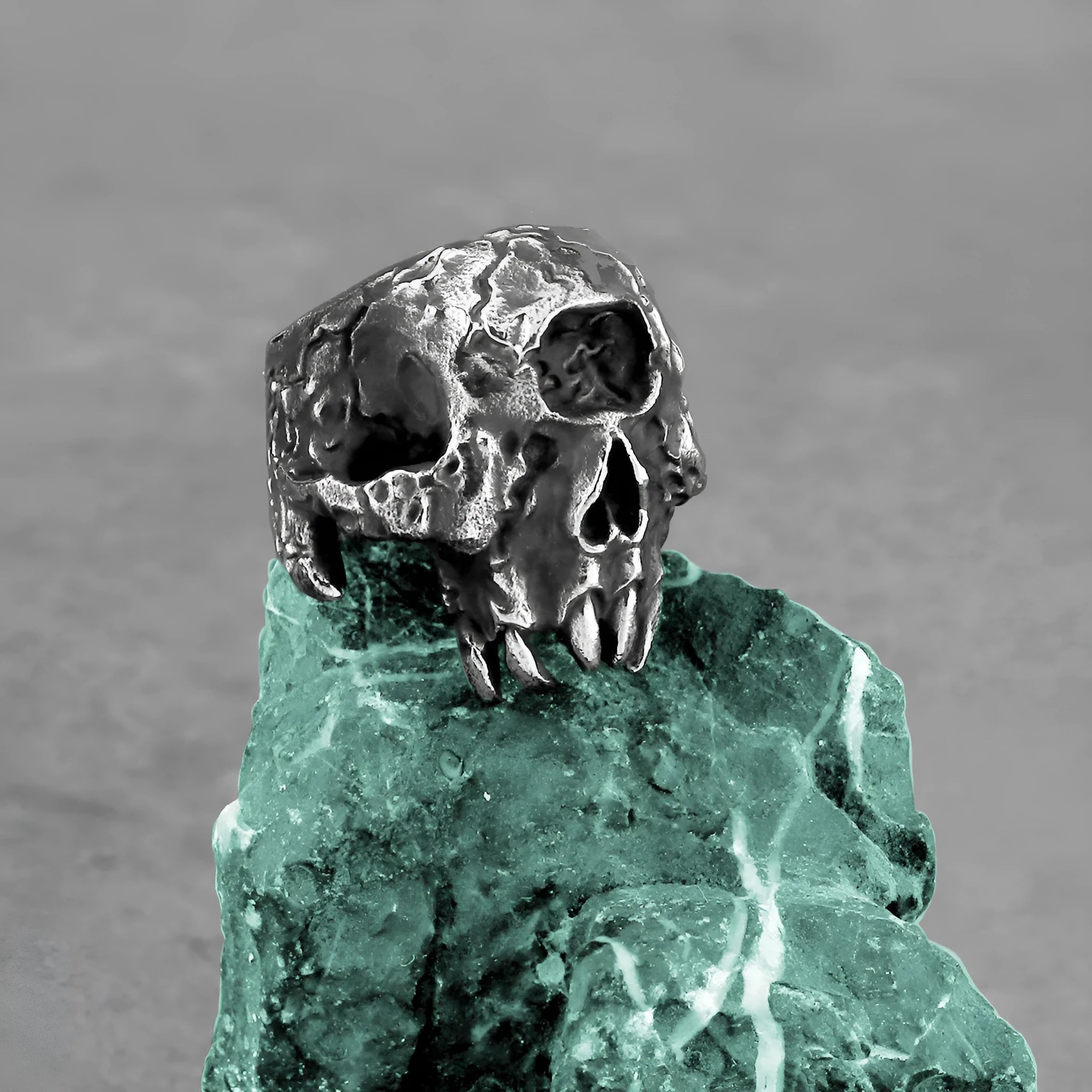 Electroplated alloy skull ring showing one-eyed design on finger, retro punk hip hop style