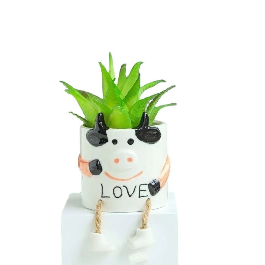 Ceramic hanging foot flowerpot in a cartoon style for desktop succulents.
