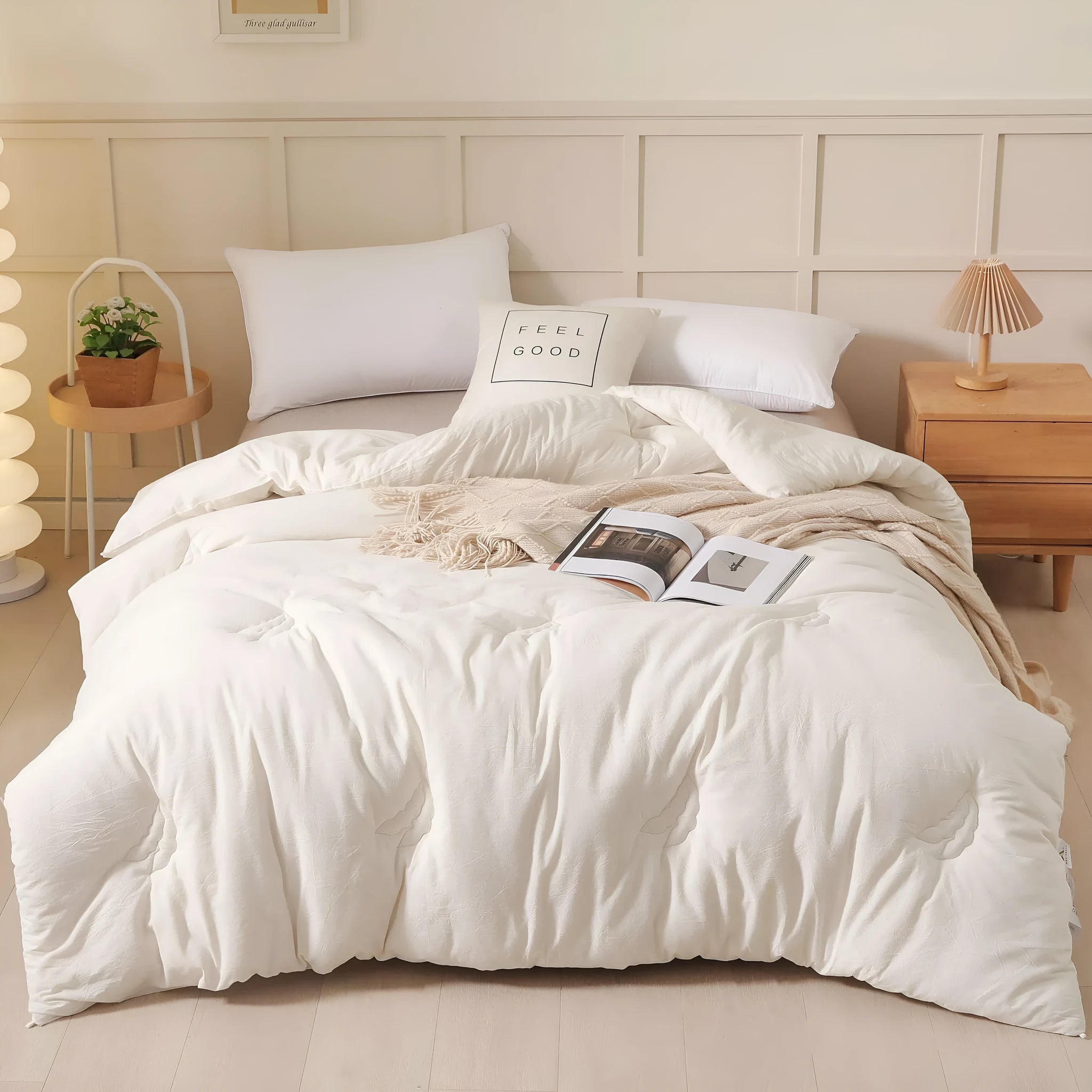 Soybean fibre quilt with pure cotton cover in grey colour on a bed.