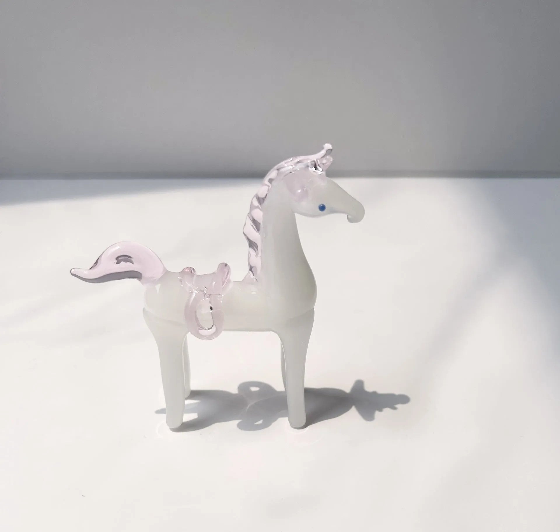 Brown glazed horse sculpture minimalist office decoration on wooden desk