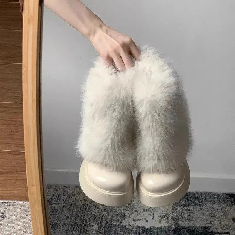 Women's low top snow boots with artificial plush construction and waterproof rubber sole