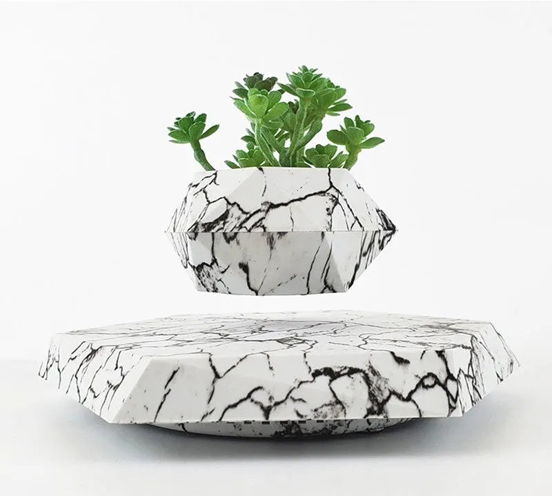 Marble colour levitating plant pot floating and rotating with magnetic technology