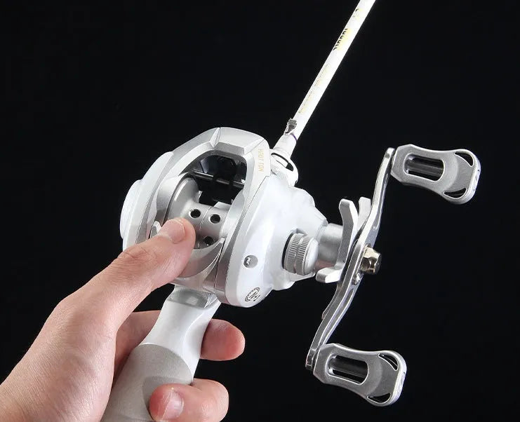Small white drip wheel baitcasting fishing reel for micro lures with left or right hand retrieve options