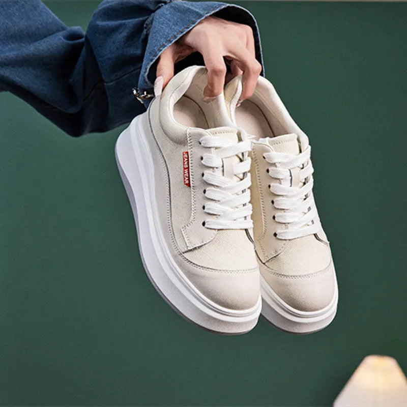 Women's beige and pink thick-soled leather casual platform board shoes.