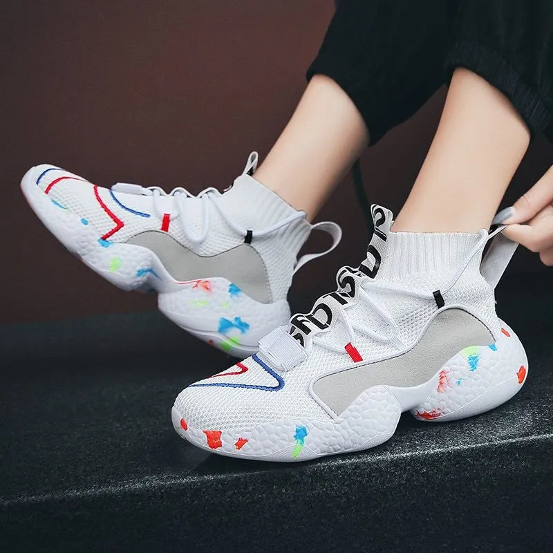 Men's camouflage pattern vulcanised sneakers with mesh upper and flat rubber sole.