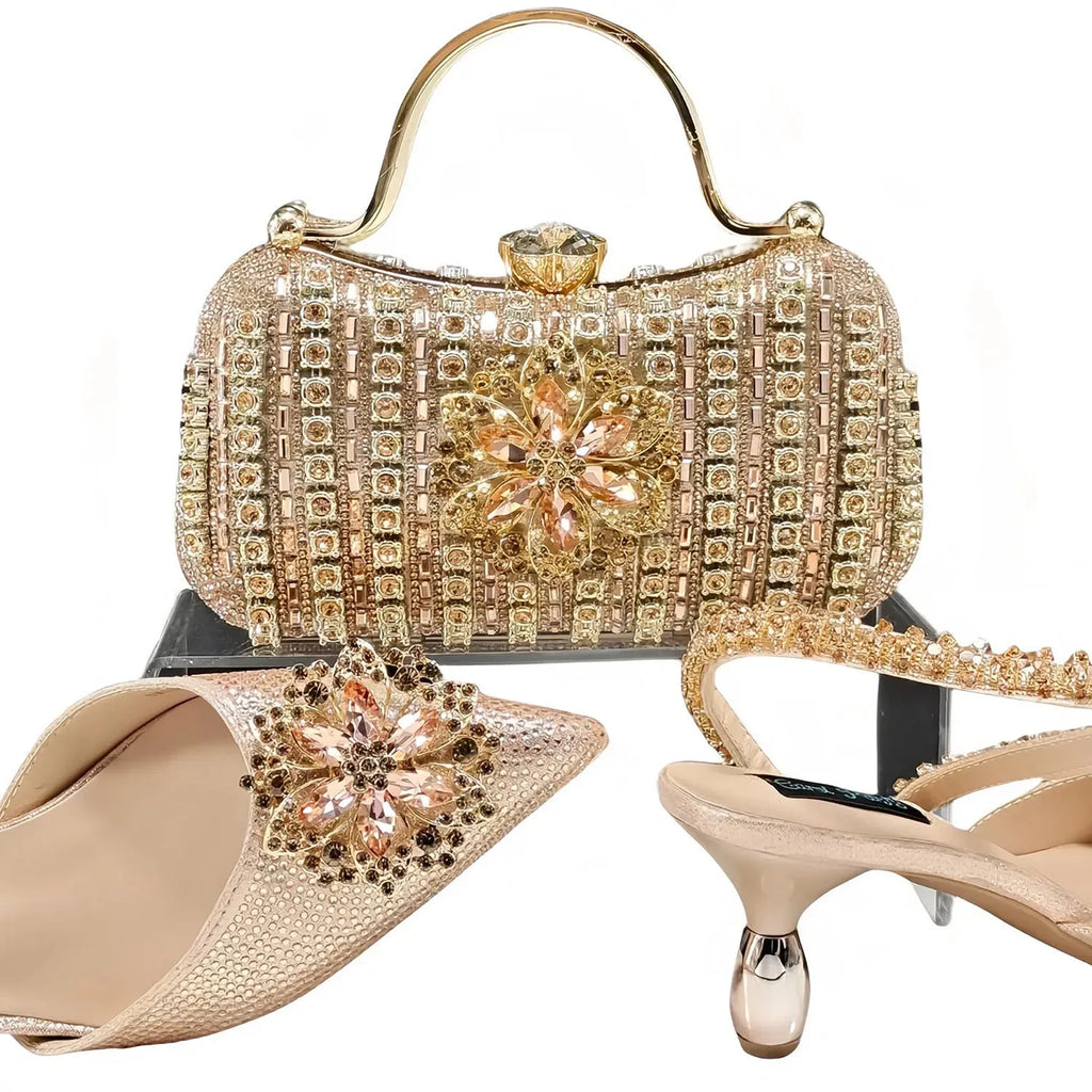 Women's high heel shoes with matching clutch bag featuring decorative flower buckle and ankle chain detail