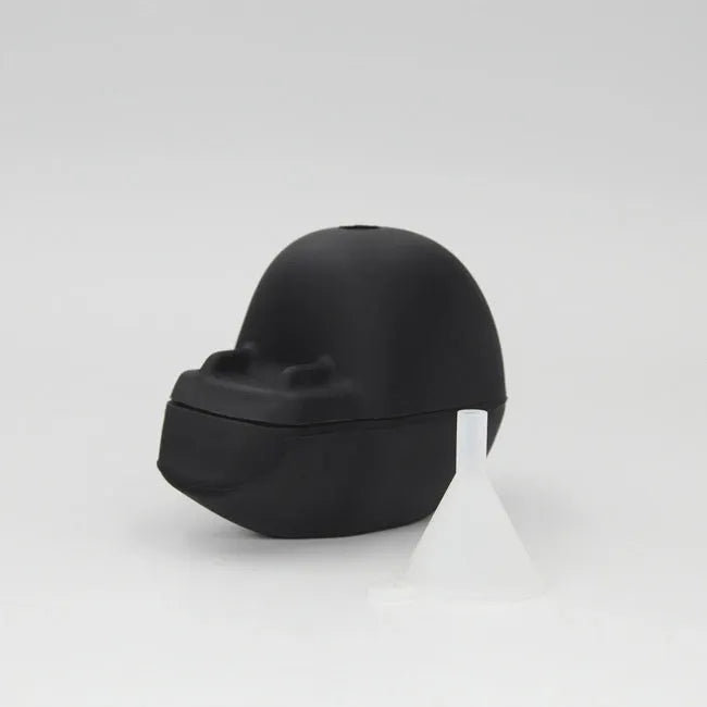 Halloween ice cube tray creating 3D skull-shaped ice moulds from food-grade silicone