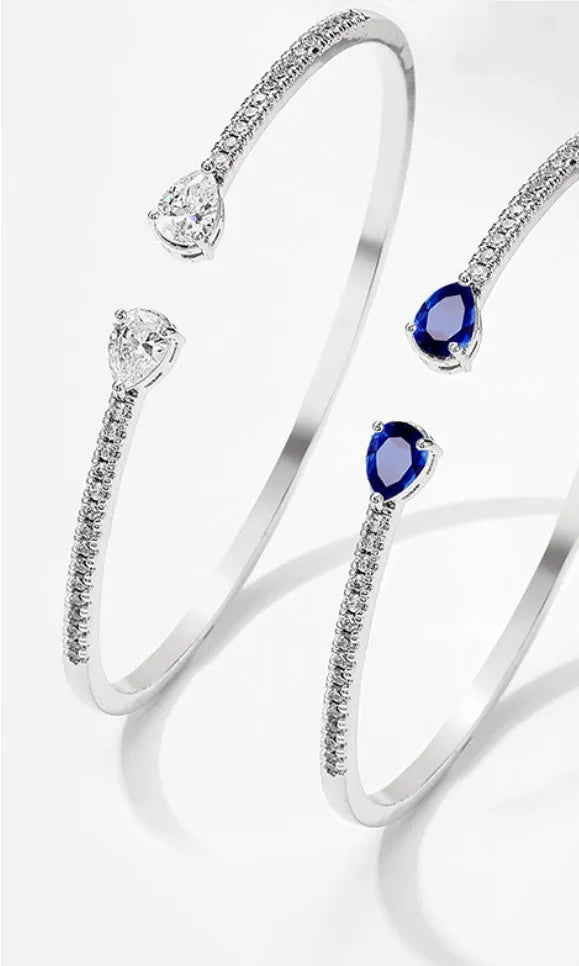 Personalised multi-zircon bracelet in blue or white colour on a copper band with simple style